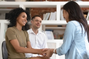 empathetic leader holding employee hand