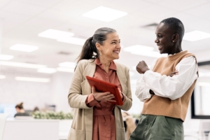 coworkers chatting in office