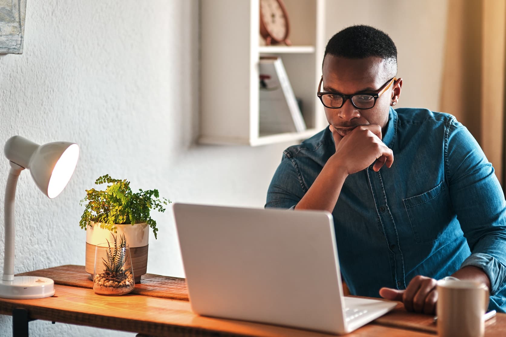 man working remotely dealing with conflict